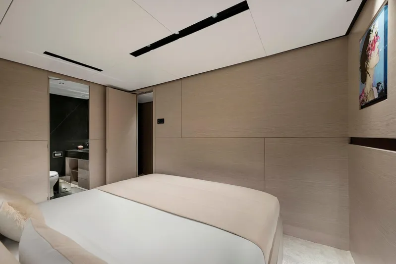  Yacht Photos Pics Luxurious bedroom interior of 2025 Mazu Yachts 92 DS with modern design and ensuite bathroom.