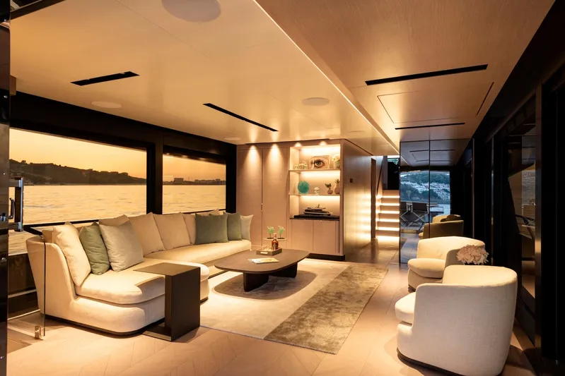  Yacht Photos Pics Luxurious interior of 2025 Mazu Yachts 92 DS with elegant seating and sunset view.
