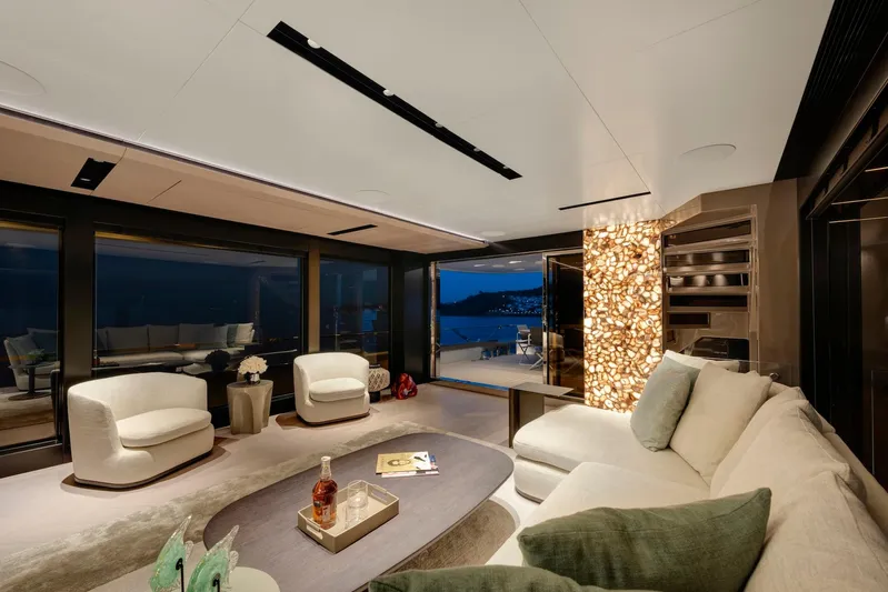  Yacht Photos Pics Luxurious interior of 2025 Mazu Yachts 92 DS with elegant seating and ambient lighting.
