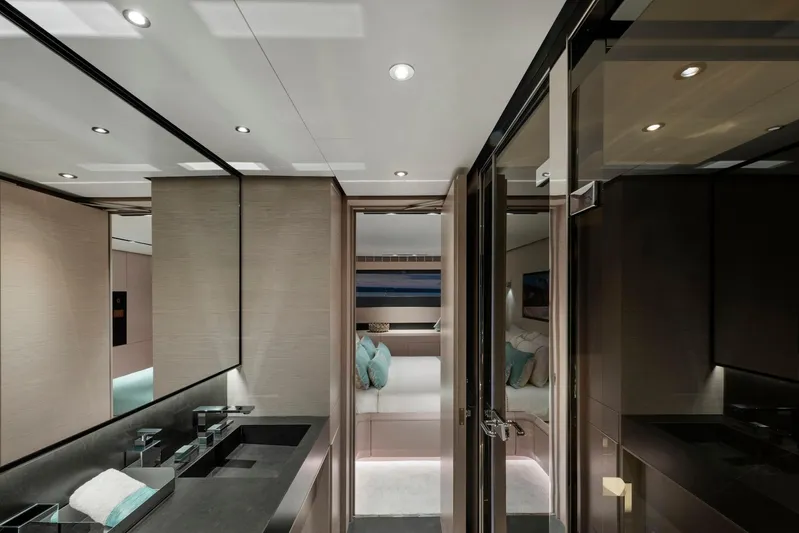  Yacht Photos Pics Luxurious interior of 2025 Mazu Yachts 92 DS, featuring modern bathroom and cozy bedroom.