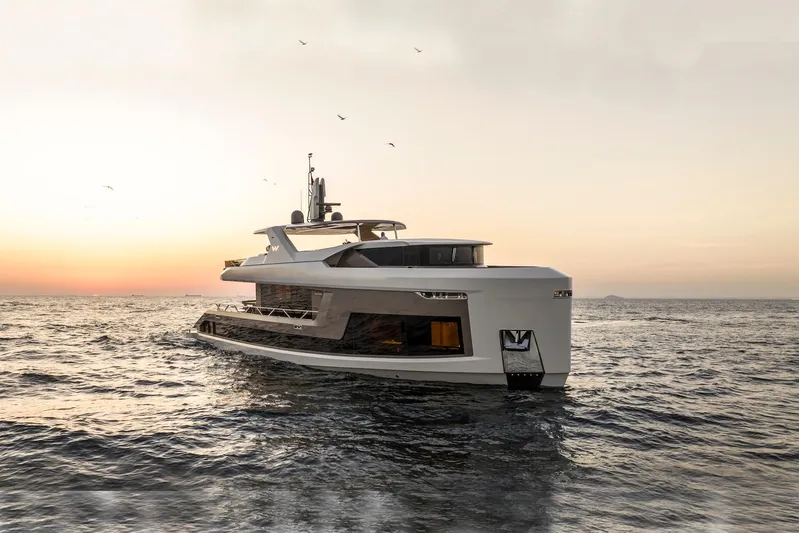  Yacht Photos Pics Luxury 2025 Mazu Yachts 92 DS cruising at sunset on open sea.