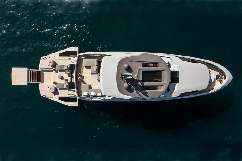  Yacht Photos Pics Aerial view of 2025 Mazu Yachts 92 DS luxury yacht on open water.