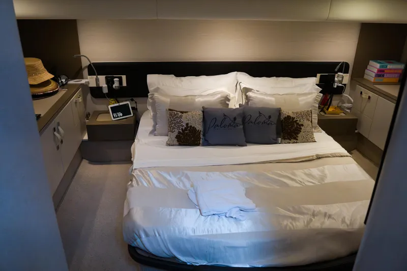 La Paloma Yacht Photos Pics Luxurious bedroom interior of 2019 Azimut Fly 50 yacht with elegant bedding and decor.