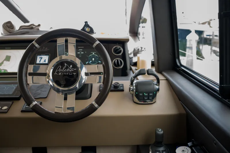 La Paloma Yacht Photos Pics Steering wheel and controls of 2019 Azimut Fly 50 yacht cockpit.