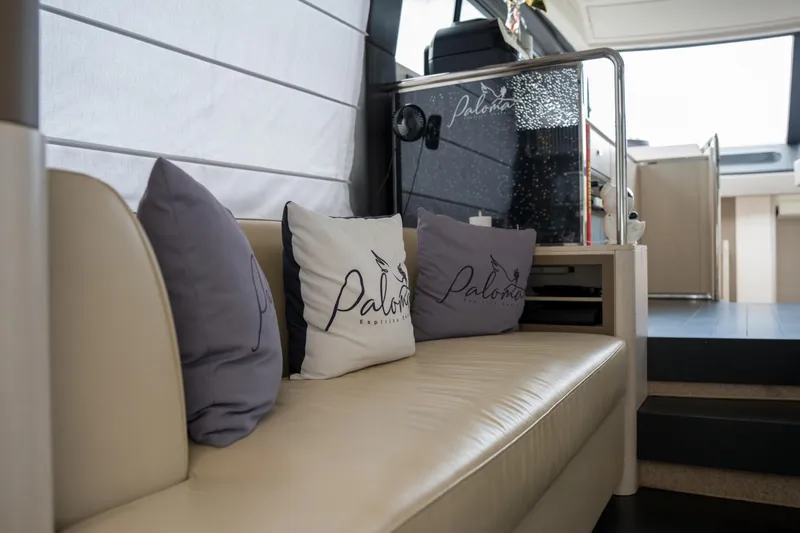 La Paloma Yacht Photos Pics Luxurious interior of 2019 Azimut Fly 50 yacht with elegant seating and decorative pillows.
