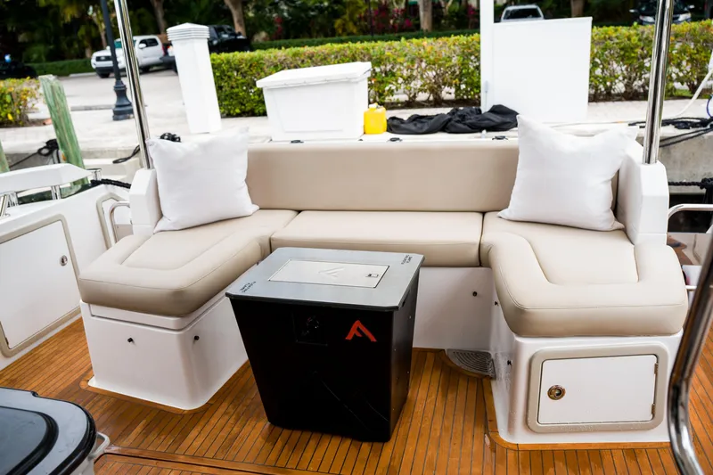 La Paloma Yacht Photos Pics Luxurious seating area on 2019 Azimut Fly 50 yacht with beige cushions and pillows.