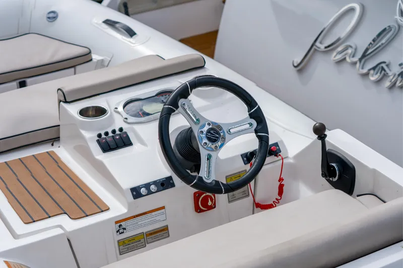La Paloma Yacht Photos Pics Steering console of 2019 Azimut Fly 50 yacht with controls and seating.