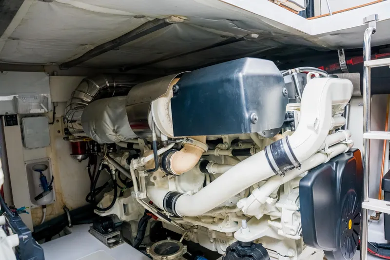 La Paloma Yacht Photos Pics Engine room of a 2019 Azimut Fly 50 yacht, showcasing detailed machinery components.