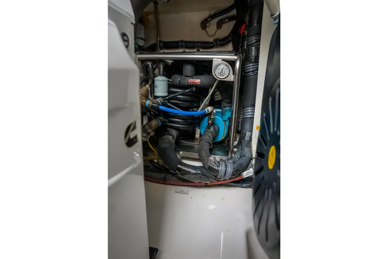 La Paloma Yacht Photos Pics Engine room of 2019 Azimut Fly 50 yacht with visible machinery and hoses.