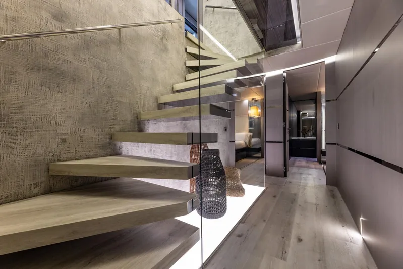 Maverick Yacht Photos Pics Modern interior of 2013 Admiral Impero 40 yacht with sleek staircase design.