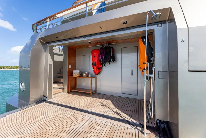 Maverick Yacht Photos Pics Luxury yacht Admiral Impero 40, 2013 model, featuring a spacious deck with water sports equipment.