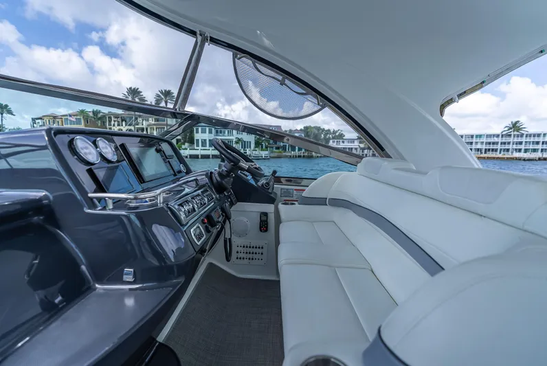  Yacht Photos Pics 2022 Formula 40 PC yacht interior with modern dashboard and luxurious seating.