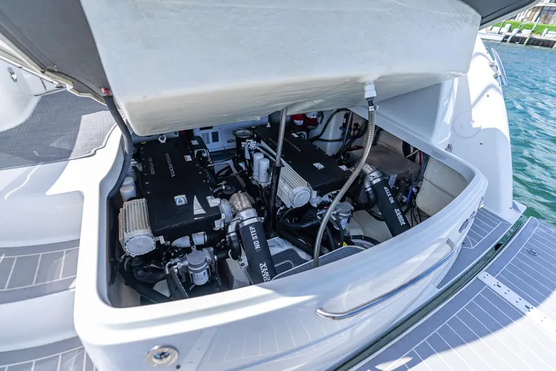  Yacht Photos Pics Engine compartment of a 2022 Formula 40 PC boat, showcasing dual engines and mechanical components.