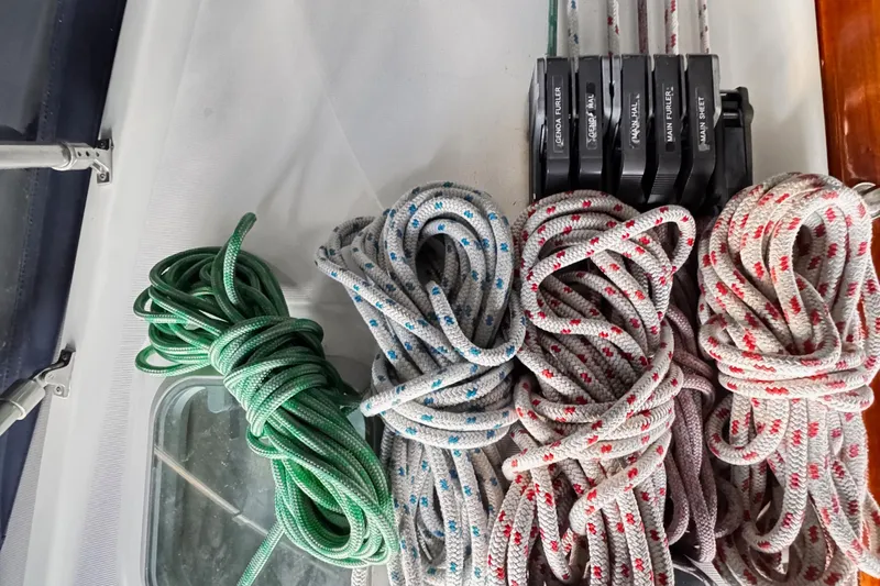 Yacht Photos Pics Coiled ropes and clutches on Jeanneau Sun Odyssey 43 DS, 2001 sailboat deck.