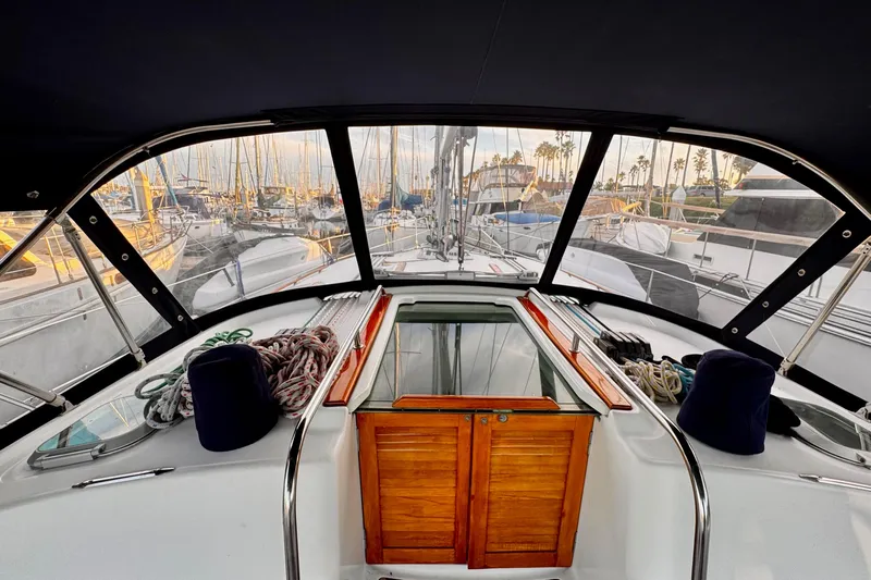  Yacht Photos Pics Cockpit view of 2001 Jeanneau Sun Odyssey 43 DS sailboat in marina setting.