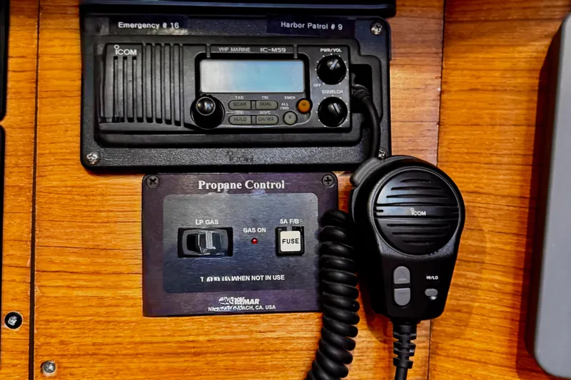  Yacht Photos Pics VHF marine radio and propane control panel on 2001 Jeanneau Sun Odyssey 43 DS yacht.