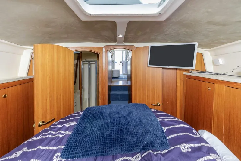 La Woman Yacht Photos Pics Interior of 2001 Mainship 390 Trawler with wood cabinetry and modern amenities.