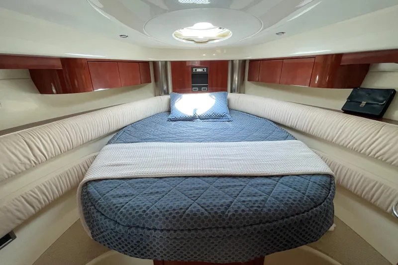 Pearl Yacht Photos Pics Luxurious cabin interior of 2004 Fairline Targa 40 yacht with elegant bedding.