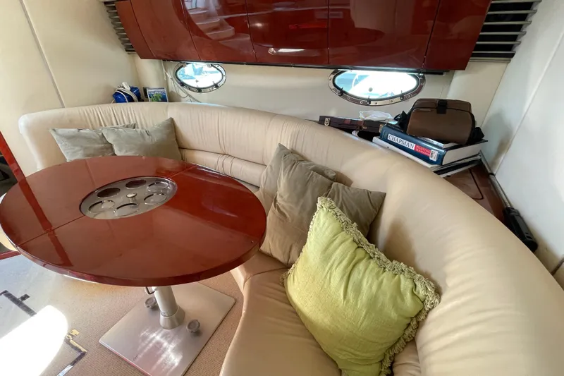 Pearl Yacht Photos Pics Luxurious interior of 2004 Fairline Targa 40 yacht with plush seating and elegant table.