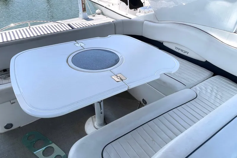Pearl Yacht Photos Pics Luxury seating area on a 2004 Fairline Targa 40 yacht with a stylish table.