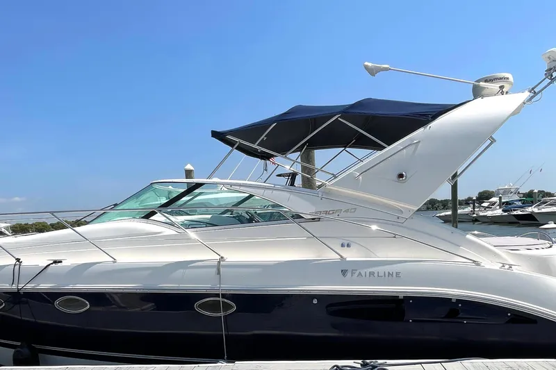 Pearl Yacht Photos Pics 2004 Fairline Targa 40 yacht docked under clear blue sky.