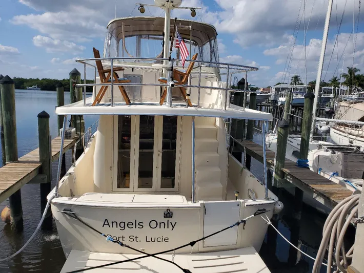Angels Only Yacht Photos Pics 2007 Mainship 400 Trawler docked, featuring "Angels Only" name and Port St. Lucie location.