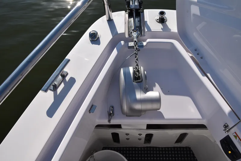 Sundog Yacht Photos Pics 2023 Axopar 37XC Wet Bar anchor compartment with chain and winch system.