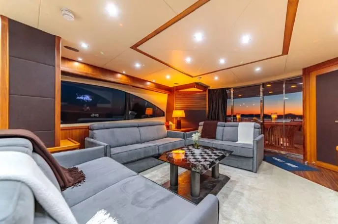  Yacht Photos Pics Luxurious Sunseeker 90 yacht interior, 2009 model, featuring elegant seating and ambient lighting.