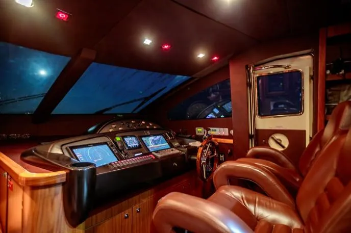  Yacht Photos Pics Luxurious 2009 Sunseeker 90 yacht cockpit with leather seats and advanced navigation systems.