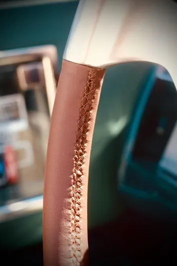  Yacht Photos Pics Close-up of Riva Aquariva 33's leather-stitched steering wheel, 2003 model.