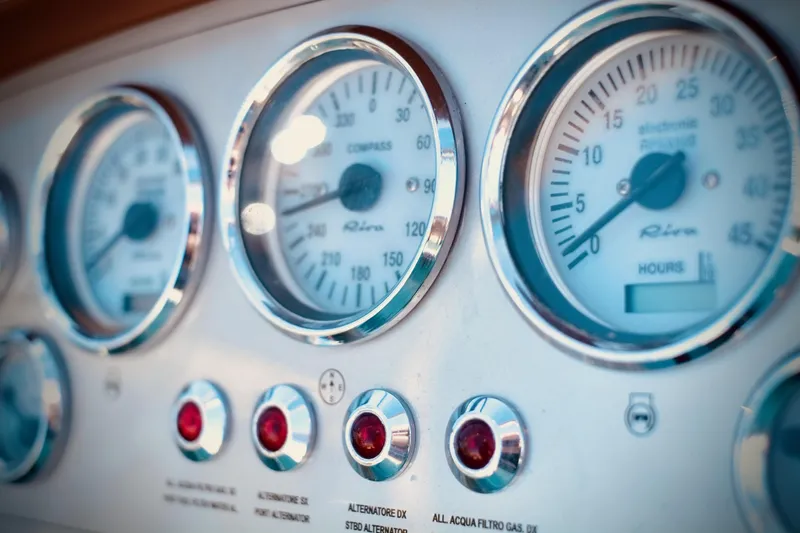  Yacht Photos Pics Close-up of 2003 Riva Aquariva 33 dashboard gauges and controls.