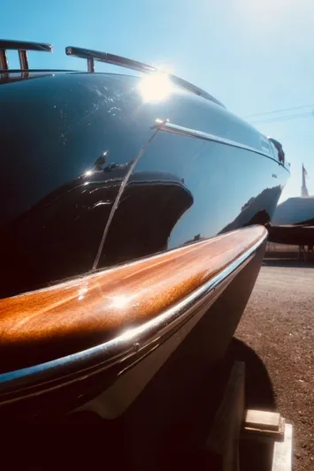  Yacht Photos Pics 2003 Riva Aquariva 33 boat with sleek design and polished wood accents.