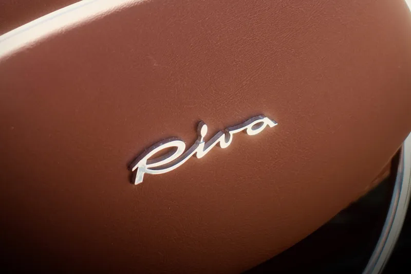  Yacht Photos Pics Riva Aquariva 33 logo on brown leather, 2003 model boat detail.