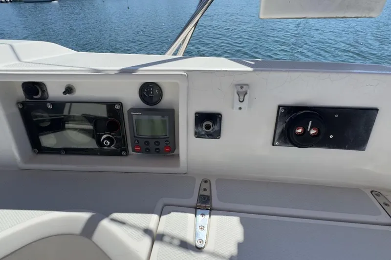Finesse Yacht Photos Pics Control panel of a 2005 Sabre 386 boat with navigation instruments.