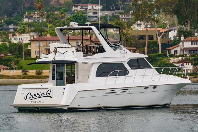 Carrin G Yacht Photos Pics 2008 Navigator 4600 Pilothouse yacht docked in scenic San Diego harbor.