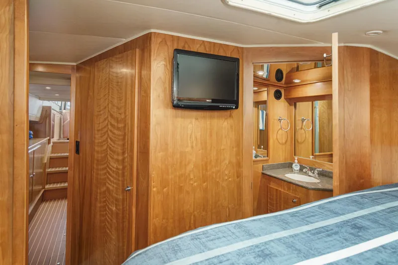 Carrin G Yacht Photos Pics Luxurious 2008 Navigator 4600 Pilothouse interior with wood paneling and modern amenities.