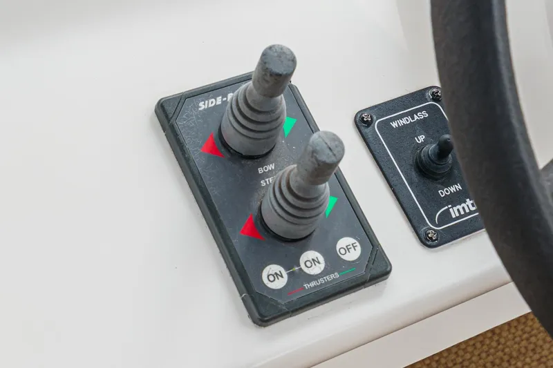 Carrin G Yacht Photos Pics Control panel of a 2008 Navigator 4600 Pilothouse with thruster and windlass switches.