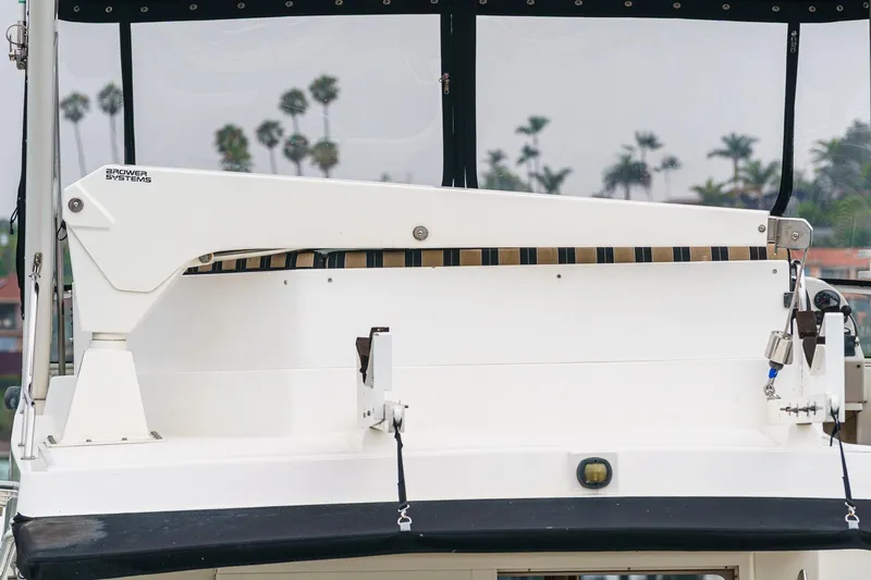 Carrin G Yacht Photos Pics 2008 Navigator 4600 Pilothouse yacht with Brower Systems equipment, palm trees in background.