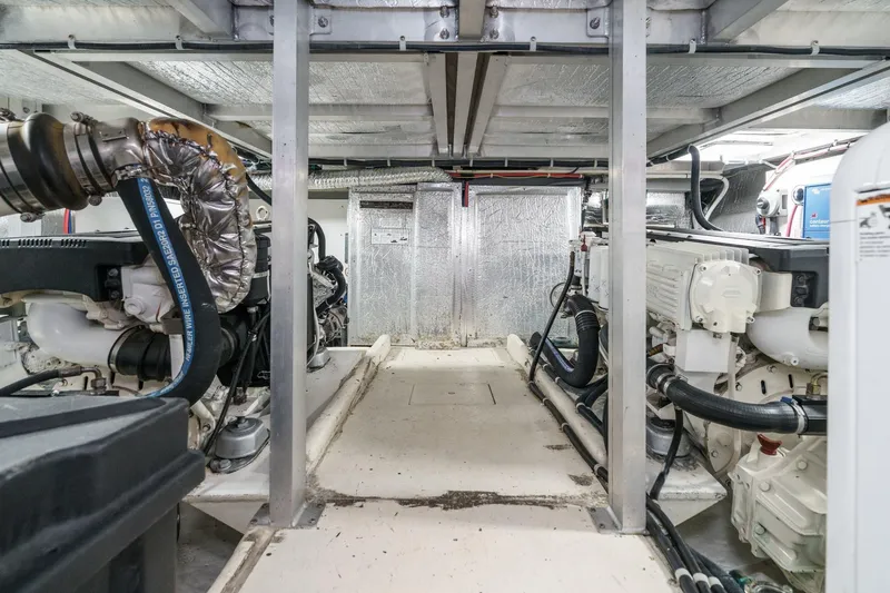 Carrin G Yacht Photos Pics Engine room of 2008 Navigator 4600 Pilothouse with visible machinery and piping.