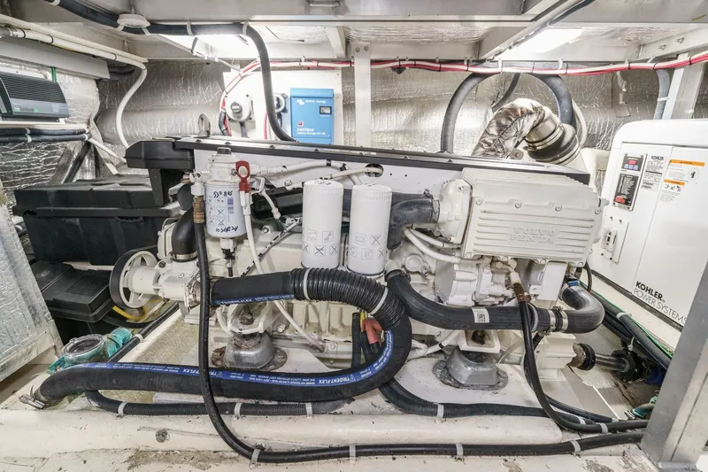 Carrin G Yacht Photos Pics Engine room of 2008 Navigator 4600 Pilothouse with Volvo Penta engine and Kohler power system.