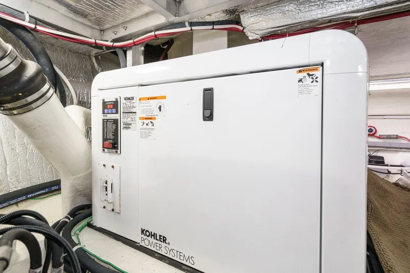 Carrin G Yacht Photos Pics Kohler power system in 2008 Navigator 4600 Pilothouse engine room.