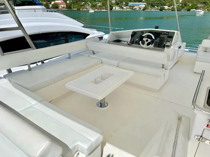 Jamsam Yacht Photos Pics Luxurious 2017 Leopard 51 Powercat yacht with spacious white seating and helm station.