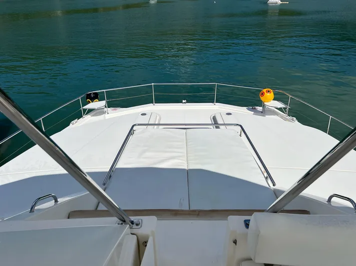 Jamsam Yacht Photos Pics 2017 Leopard 51 Powercat yacht deck overlooking calm waters.