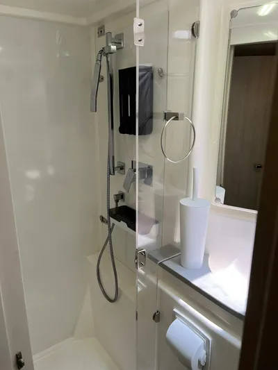 Jamsam Yacht Photos Pics Bathroom interior of 2017 Leopard 51 Powercat with modern shower and fixtures.