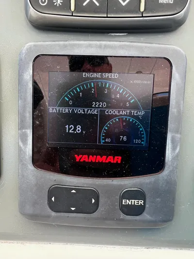 Jamsam Yacht Photos Pics Yanmar engine display showing speed, battery voltage, and coolant temperature on a Leopard 51 Powercat.