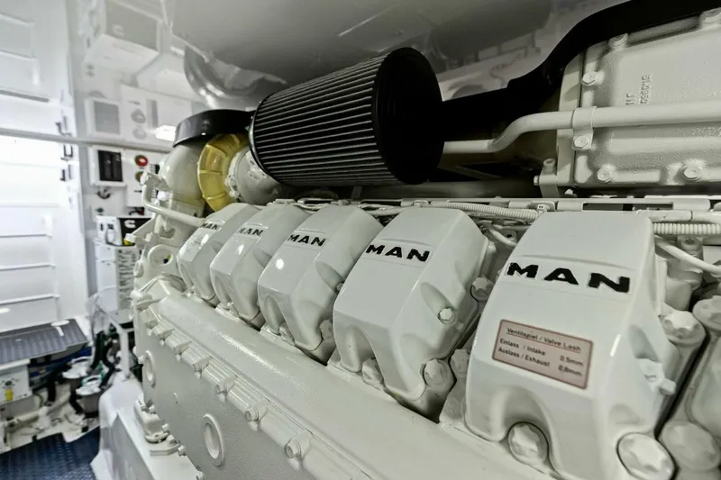Olde Floridian Yacht Photos Pics Engine room of 2023 Vikiing convertible with MAN engine components.