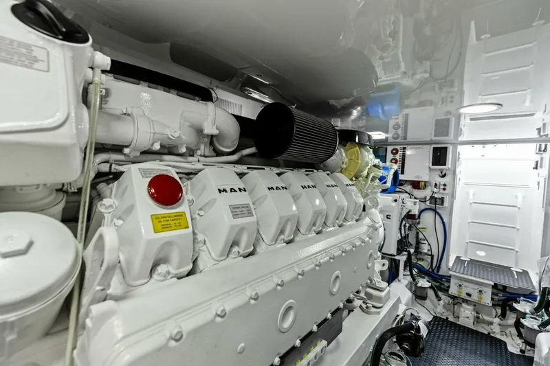 Olde Floridian Yacht Photos Pics Engine room of 2023 Vikiing convertible yacht, featuring a MAN engine and modern equipment.