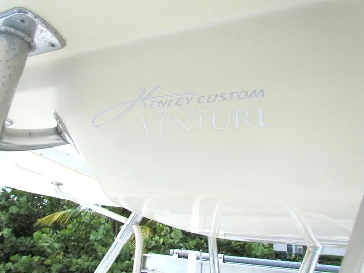  Yacht Photos Pics 2005 Venture 34 Open boat with Henley Custom branding.