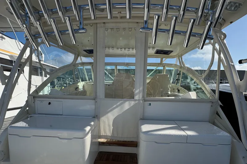 Stewartship Yacht Photos Pics 2007 Albemarle 410 Express Fisherman boat interior with rod holders and seating.