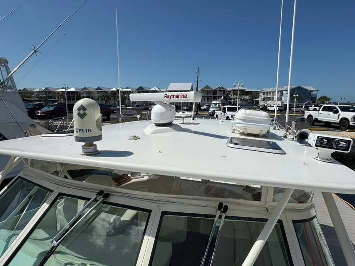 Stewartship Yacht Photos Pics 2007 Albemarle 410 Express Fisherman boat with radar and navigation equipment on deck.